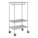 A Regency chrome wire garment rack with wheels.