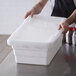 A person holding a white plastic cover for a Channel L815 lug.