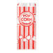 A red and white package of Carnival King popcorn bags with white stripes.