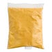 A yellow plastic bag of Gehl's Sharp Cheddar Cheese Sauce.