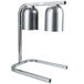 A silver metal Nemco freestanding heat lamp with two lights.
