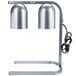 A Nemco freestanding heat lamp with two bulbs on a silver stand.