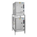 A Cleveland SteamChef 6 double deck electric steamer with metal pans inside.