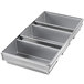 A silver rectangular metal loaf pan with three compartments.