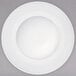 A Oneida warm white porcelain rim soup bowl with a circular pattern on the rim.