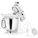 A white KitchenAid stand mixer with a whisk attachment.