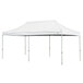A white Caravan Canopy tent with poles.