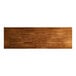 A brown rectangular wood table top with a live edge and brown stain.
