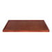 A rectangular brown wooden table top with a mahogany finish.