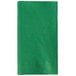 A green napkin on a white background.