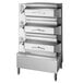 A stainless steel Cleveland Electric Pressure Steamer with three compartments.