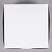 a white box with a black handle