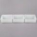 A white rectangular Choice condiment dispenser insert with 3 trays.