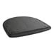 A detached black vinyl seat cushion with a stitched edge.