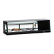 A black and white refrigerated sushi case with a glass top on a counter.