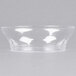 A clear Fineline Savvi Serve plastic bowl on a white surface.