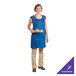 A woman in a Chef Revival royal blue apron holding a tray of bread.