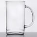 A clear plastic GET beer mug with a handle.