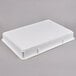 A white plastic Cambro pizza dough proofing box.