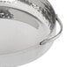 An American Metalcraft stainless steel skillet with a hammered texture and handles.