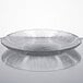 a clear glass bowl with ripples