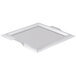 A stainless steel square serving tray with handles.