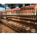 A store with shelves filled with Rosseto food dispensers.