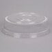 A clear plastic round high dome lid for a container.