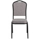 A gray Flash Furniture banquet chair with a black frame and crown back.