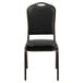 A black Flash Furniture banquet chair with a gold metal frame.