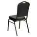 A Flash Furniture black vinyl banquet chair with gold vein frame and black cushion.