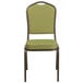 A Flash Furniture Hercules Moss Fabric Banquet Chair with metal legs.