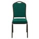 A green Flash Furniture banquet chair with a gold vein frame.