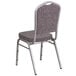 A Flash Furniture Hercules Herringbone Fabric Crown Back Stackable Banquet Chair with a silver frame and grey and white fabric.