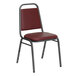 A red banquet chair with a metal frame.