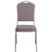 A Flash Furniture Hercules banquet chair with a gray fabric back and silver frame.