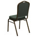 A green Flash Furniture Hercules banquet chair with a gold vein metal frame.