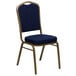 A navy blue Flash Furniture banquet chair with a gold frame.