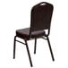 A brown Flash Furniture banquet chair with a metal frame.