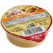 A close up of a container of Sabra Classic Hummus.