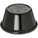 A black Carlisle melamine ramekin on a table.