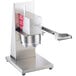 A white Edlund heavy-duty manual crown punch can opener with a red handle.