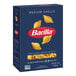 A case of 12 blue Barilla boxes of medium shells pasta.