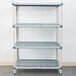 A white rectangular MetroMax Q metal shelf with small squares.