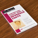 A book titled "Controlling Liquor, Wine, & Beverage Costs" on a table.