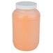 A Ken's Foods 1 gallon plastic container of French dressing with a white plastic lid.