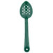 A green Thunder Group polycarbonate salad bar spoon with perforations.