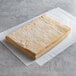 A Pennant Stay Fresh Danish pastry dough sheet on a white surface.