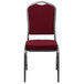 A burgundy Flash Furniture banquet chair with a silver frame.