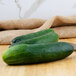 Select cucumbers on a table.